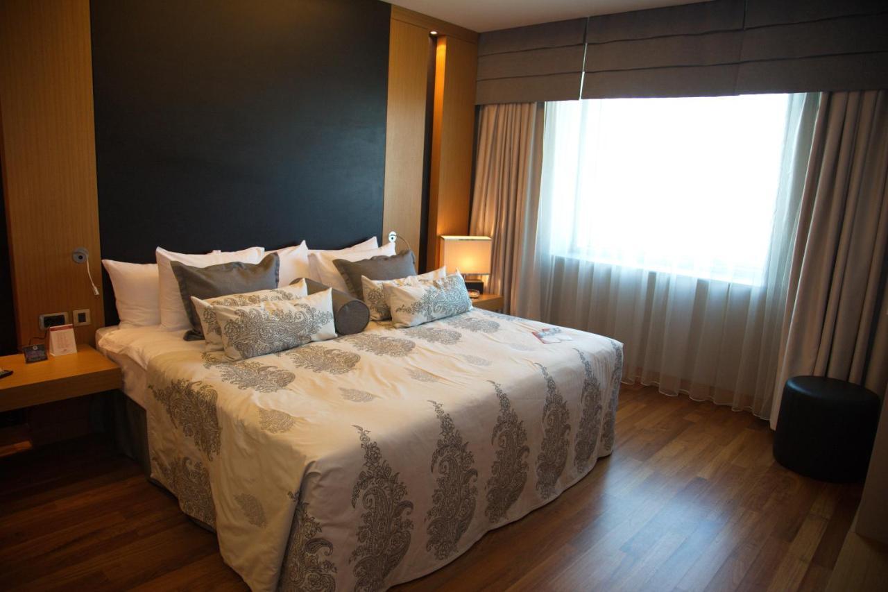 Cpankara Hotel Eksteriør bilde A bedroom in the hotel